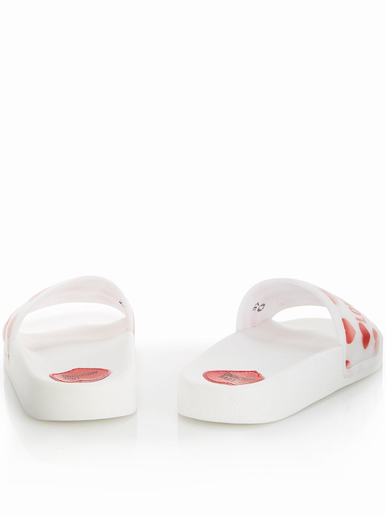 white moschino sliders