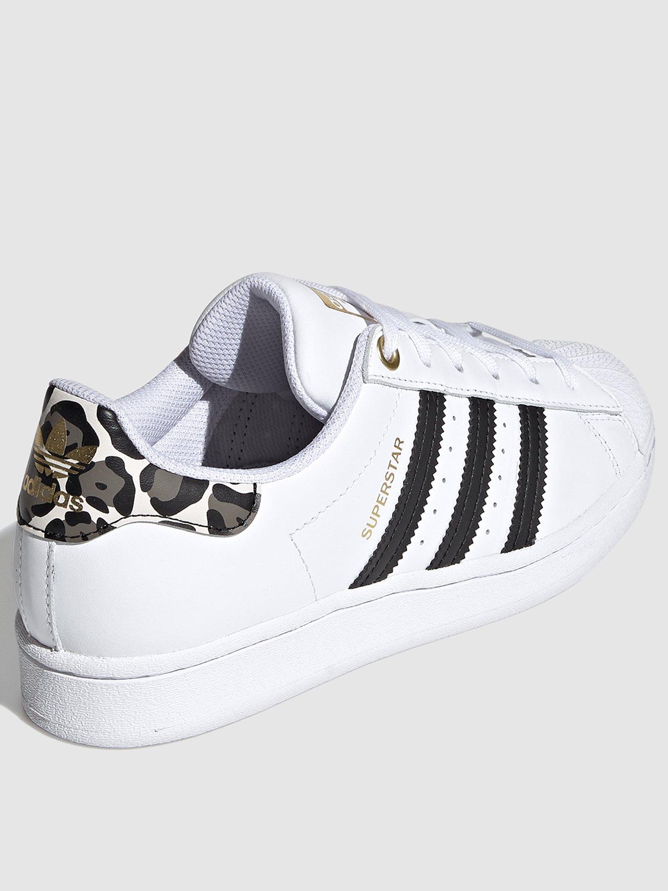 adidas white and leopard