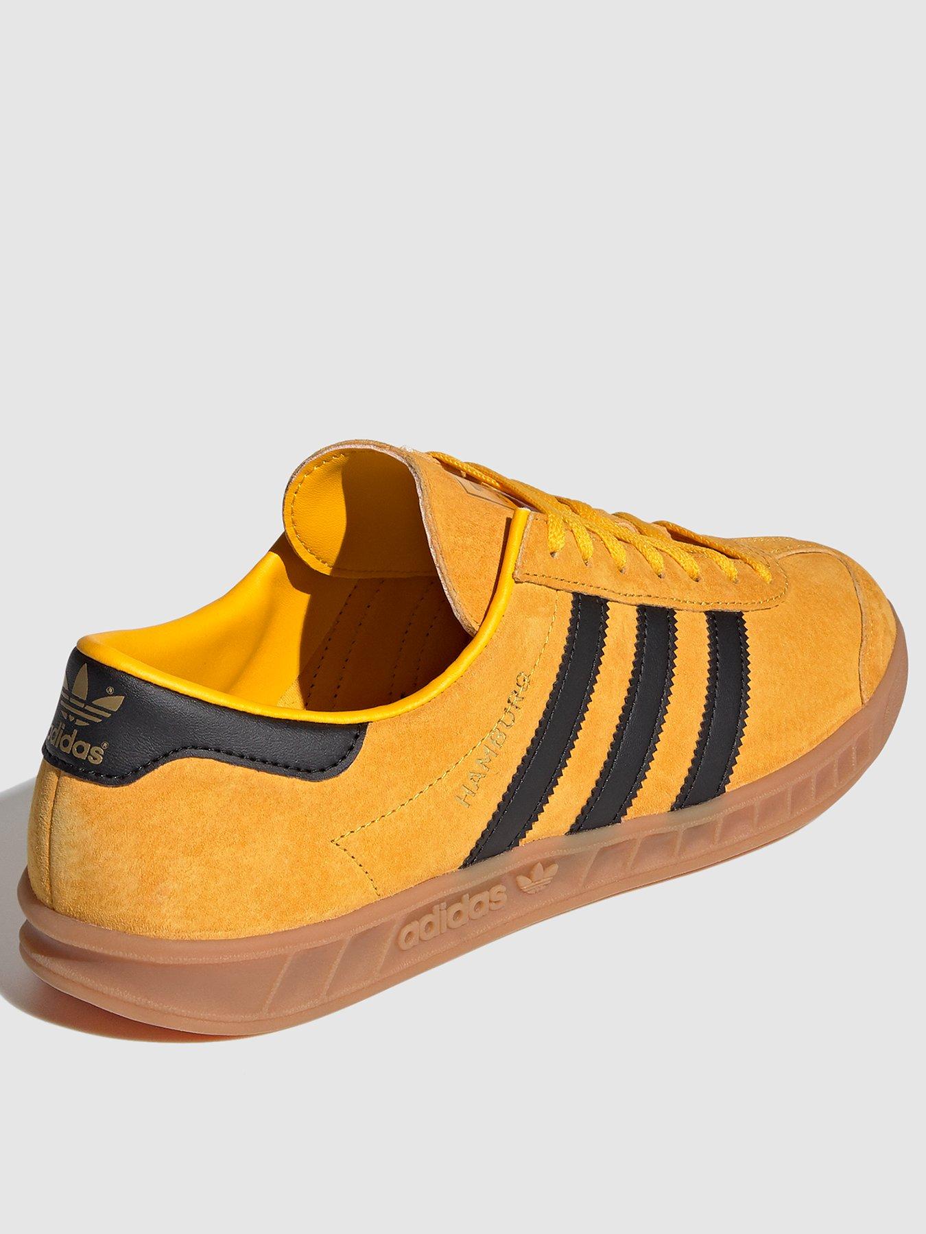 yellow and blue adidas hamburgs