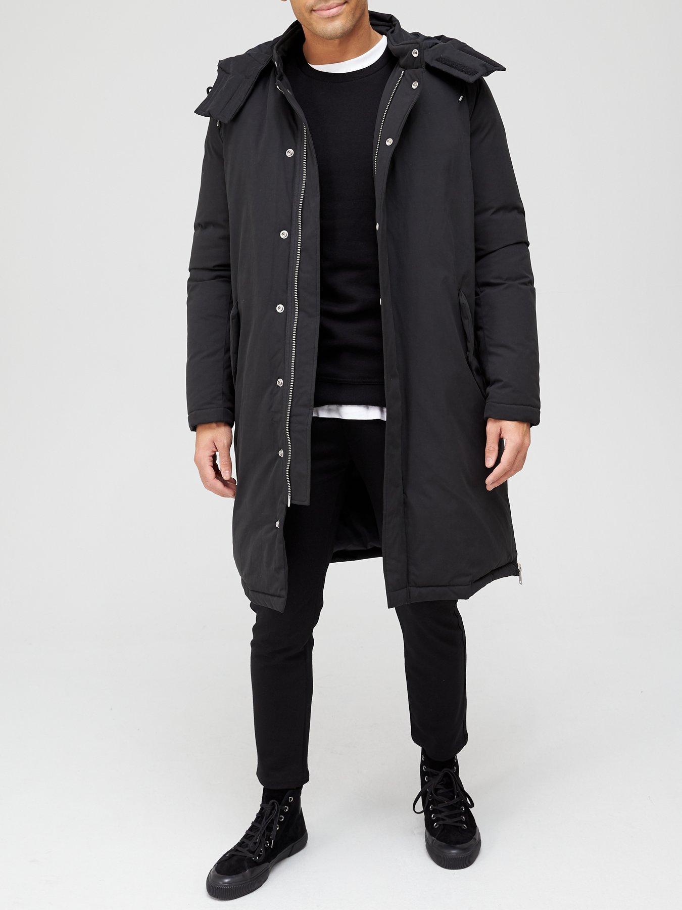 man wearing peacoat