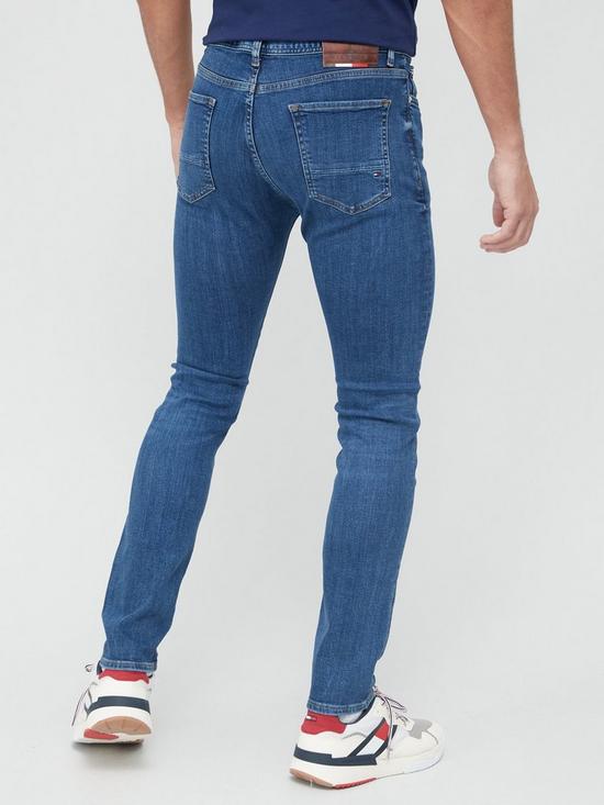 stillFront image of tommy-hilfiger-slim-fit-bleecker-power-stretch-oregon-indigo-jeans-mid-wash