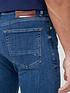  image of tommy-hilfiger-slim-fit-bleecker-power-stretch-oregon-indigo-jeans-mid-wash