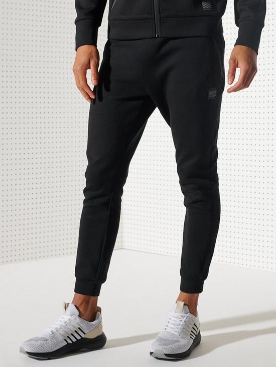 front image of superdry-training-gymtech-joggers-black