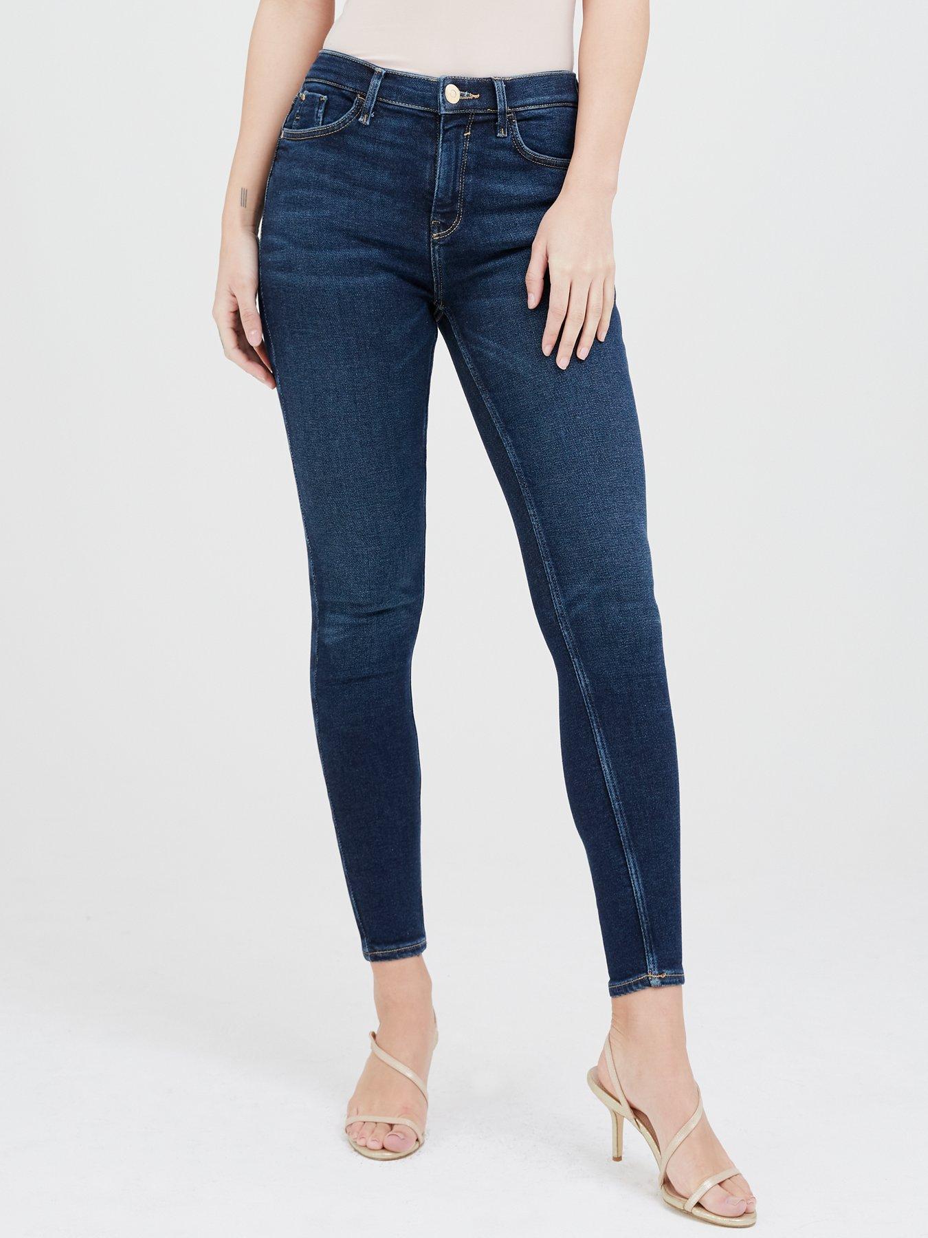 dark blue mid rise skinny jeans