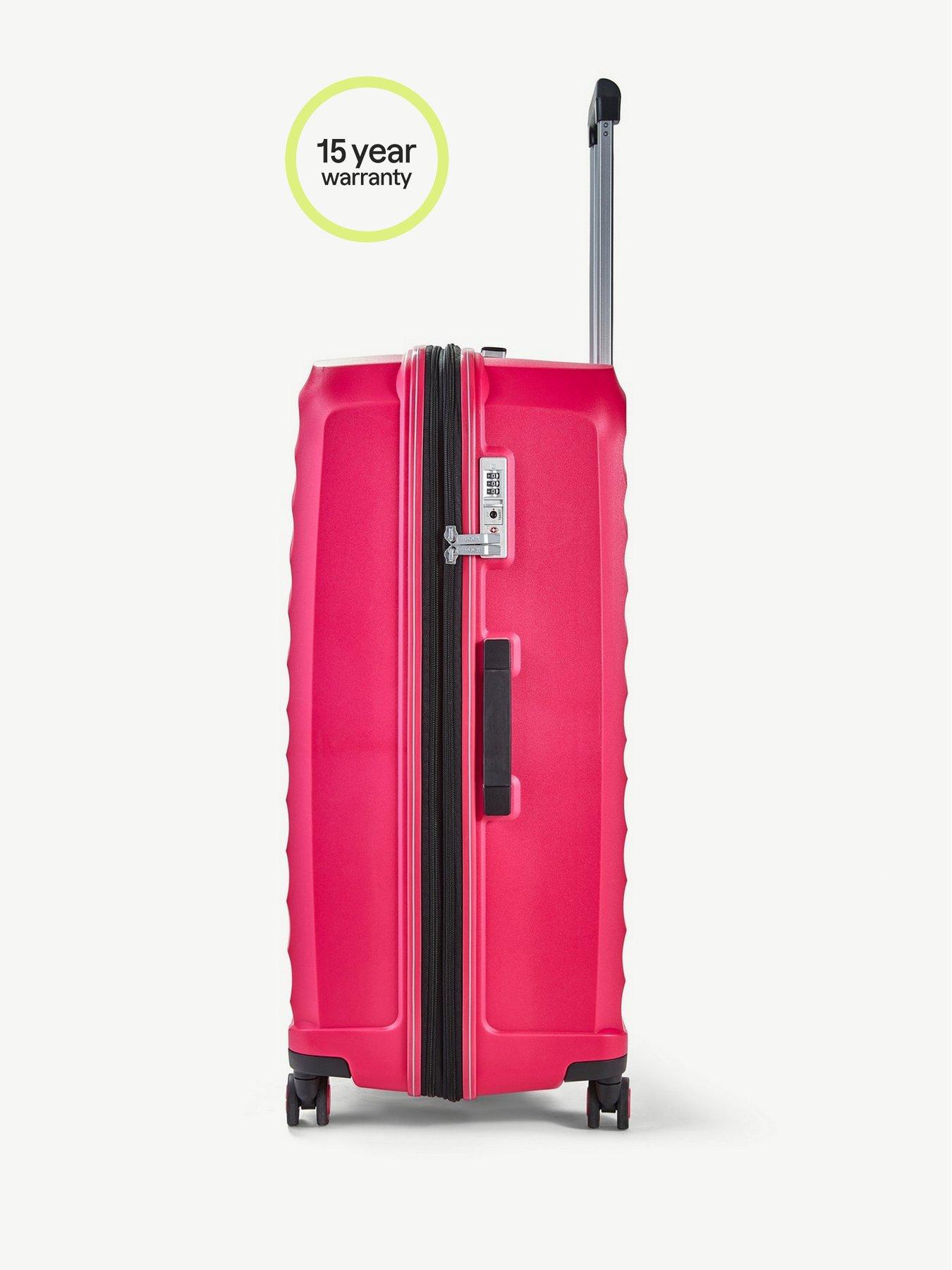 Pink hard best sale suitcases with wheels