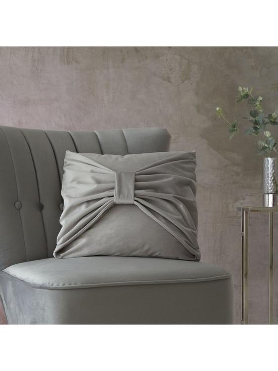 stillFront image of catherine-lansfield-velvet-bow-filled-cushion-43x43