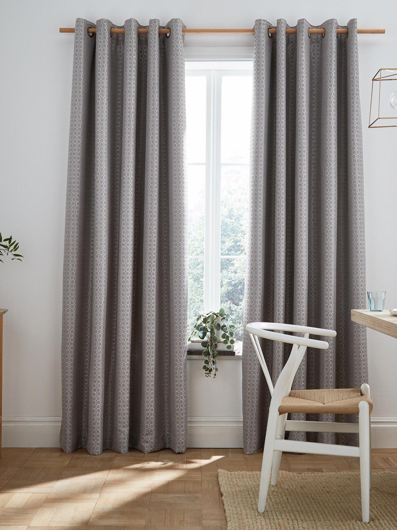 Product photograph of Ashley Wilde Flynn Blackout Lined Eyelet Curtains from very.co.uk