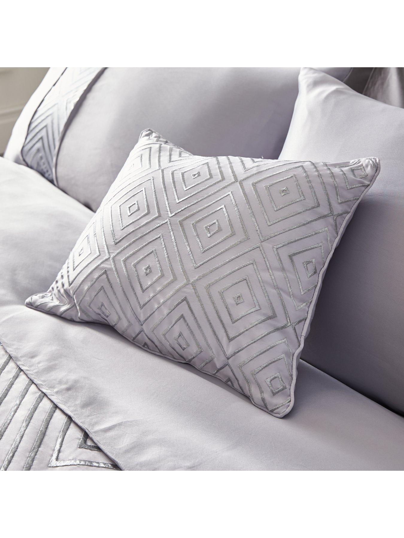 big silver cushions