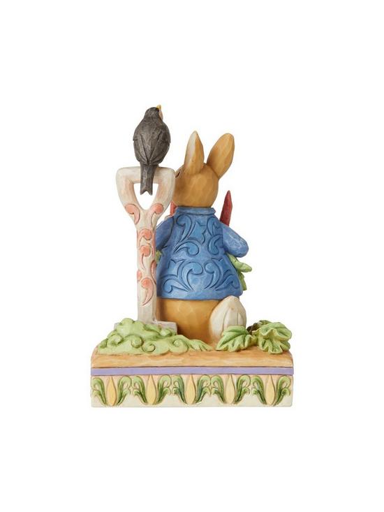 stillFront image of peter-rabbit-in-the-garden-figurine