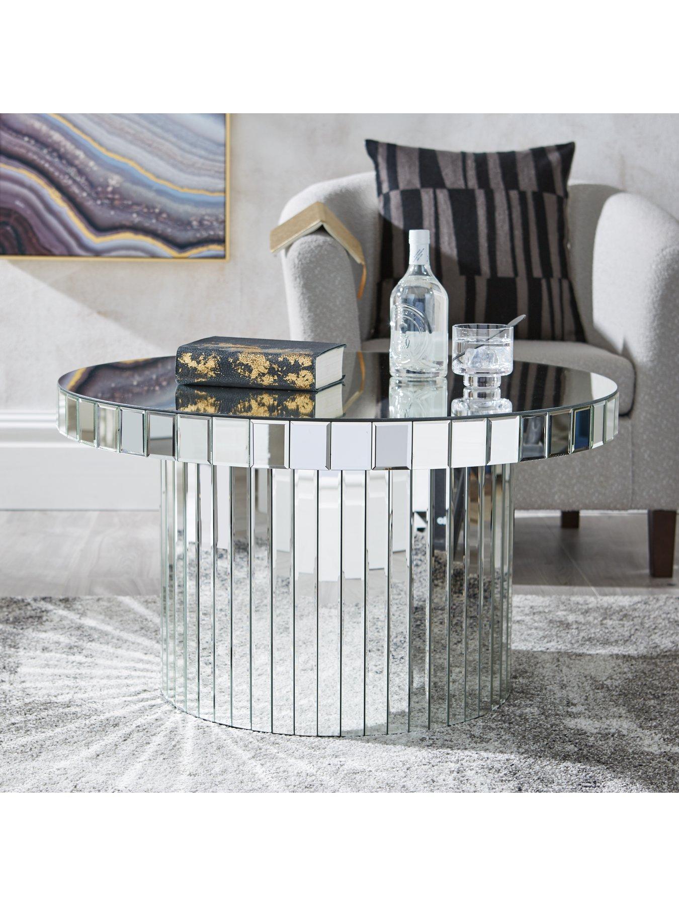 Round mirrored outlet end table