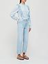  image of sofie-schnoor-high-neck-chambray-top-blue
