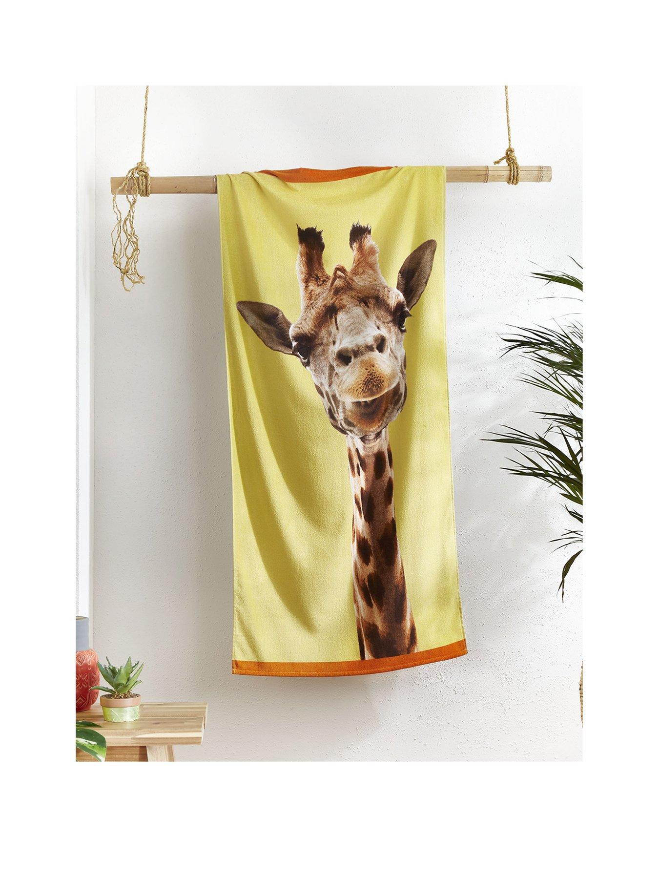 Product photograph of Catherine Lansfield Giraffe Beach Towel from very.co.uk