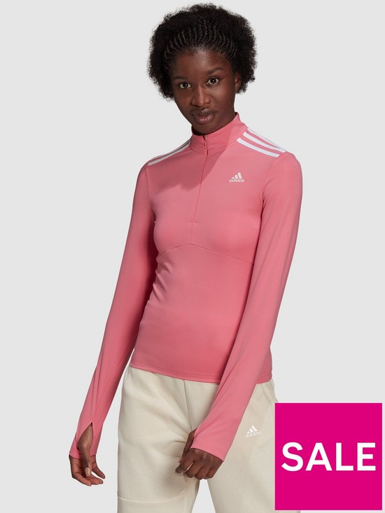 front image of adidas-badge-of-sport-quarter-zip-top-pink