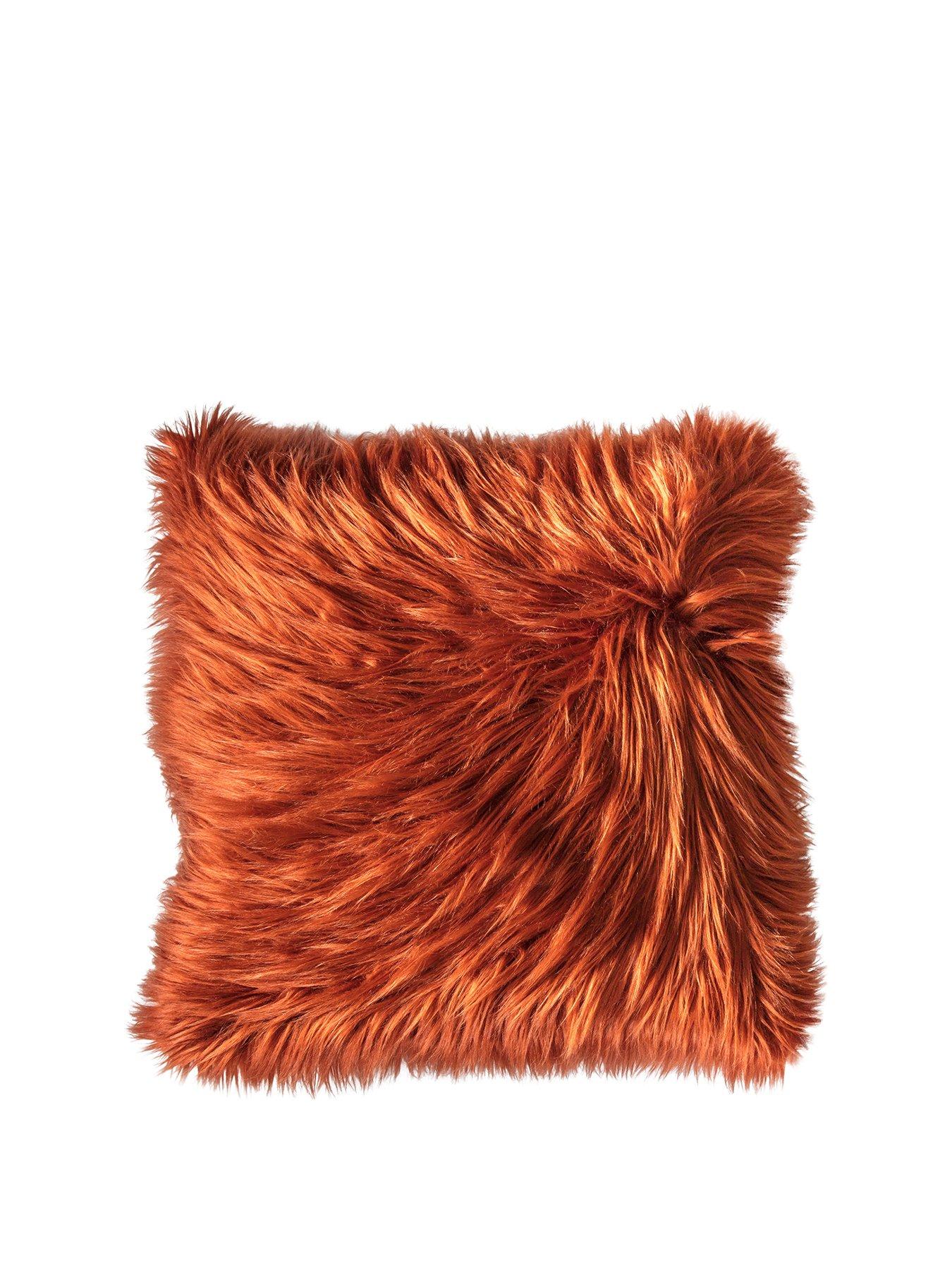 orange fluffy cushions