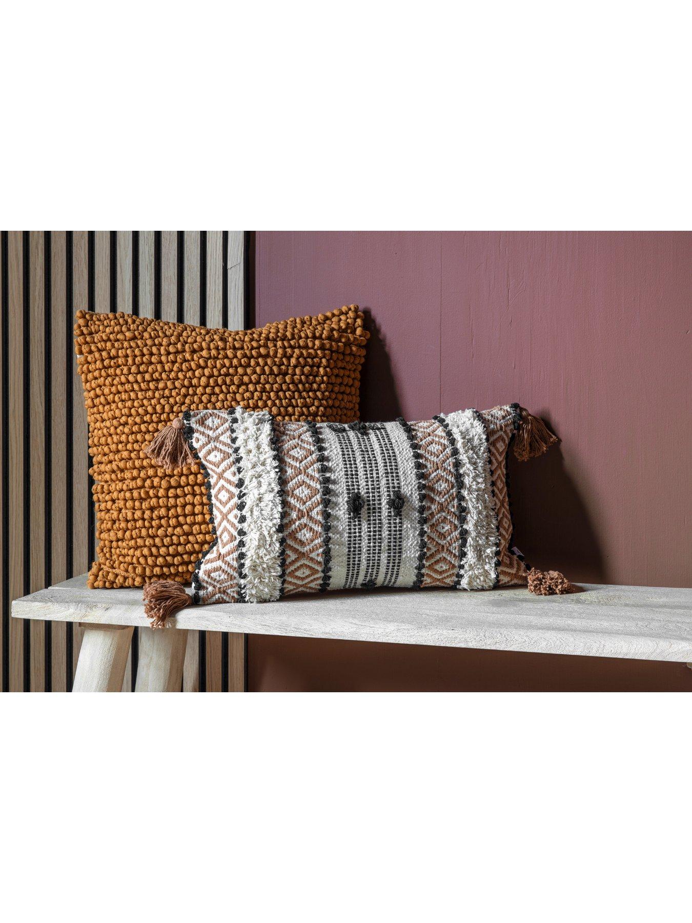 Tan and outlet grey cushions