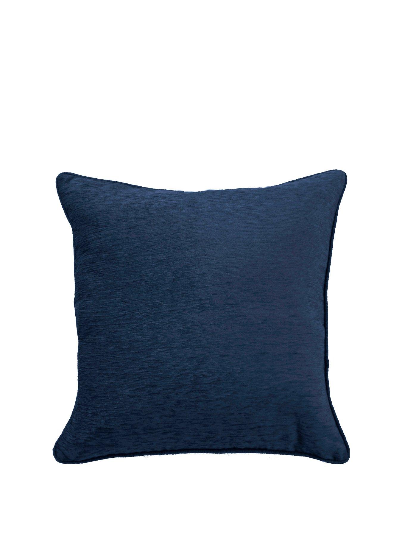 blue cushions and throws