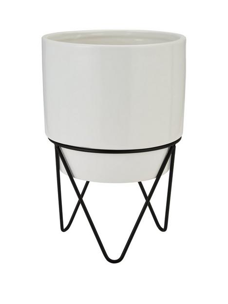 white-planter-with-black-metal-stand