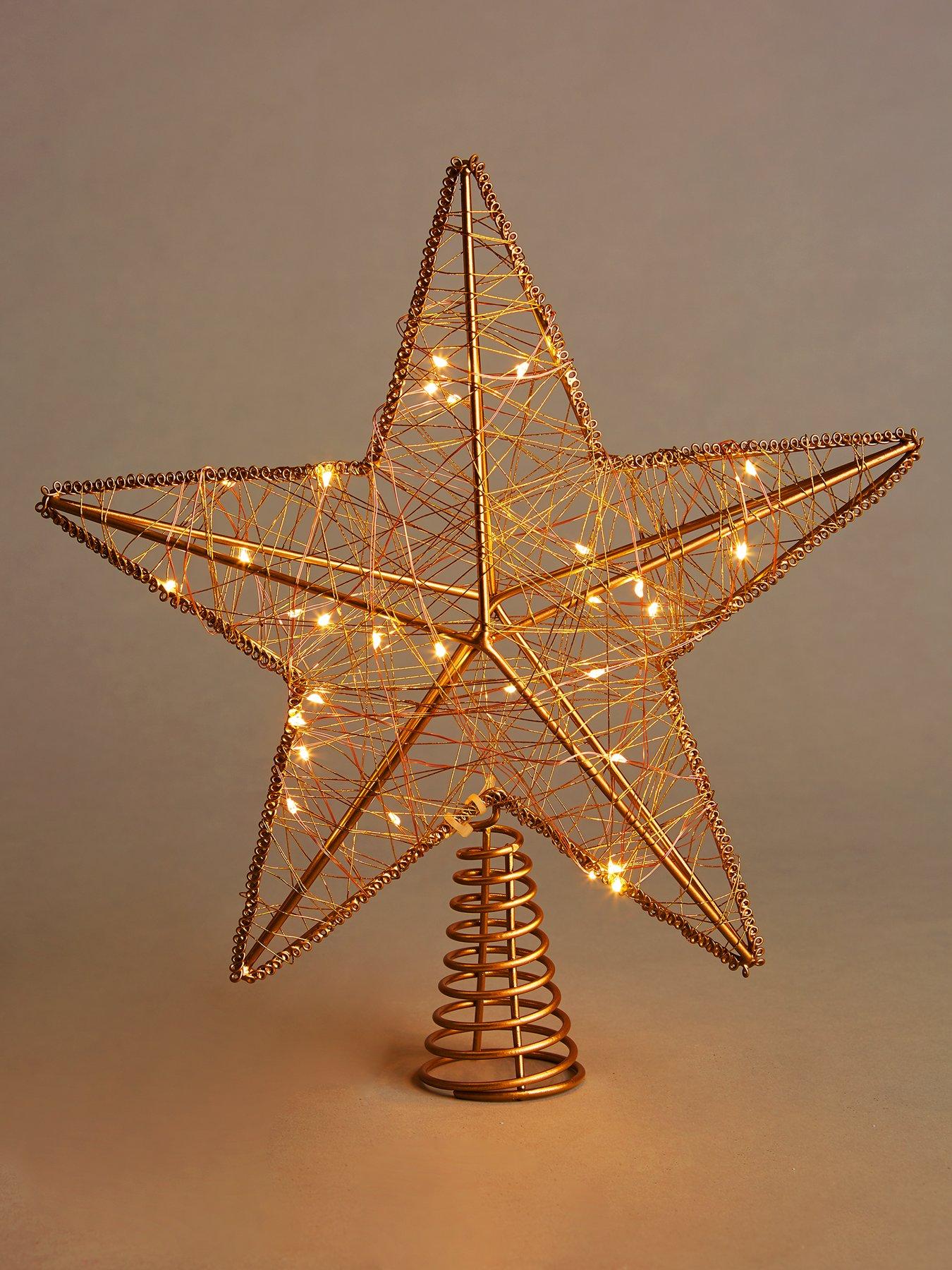 Gold light up christmas 2024 tree star