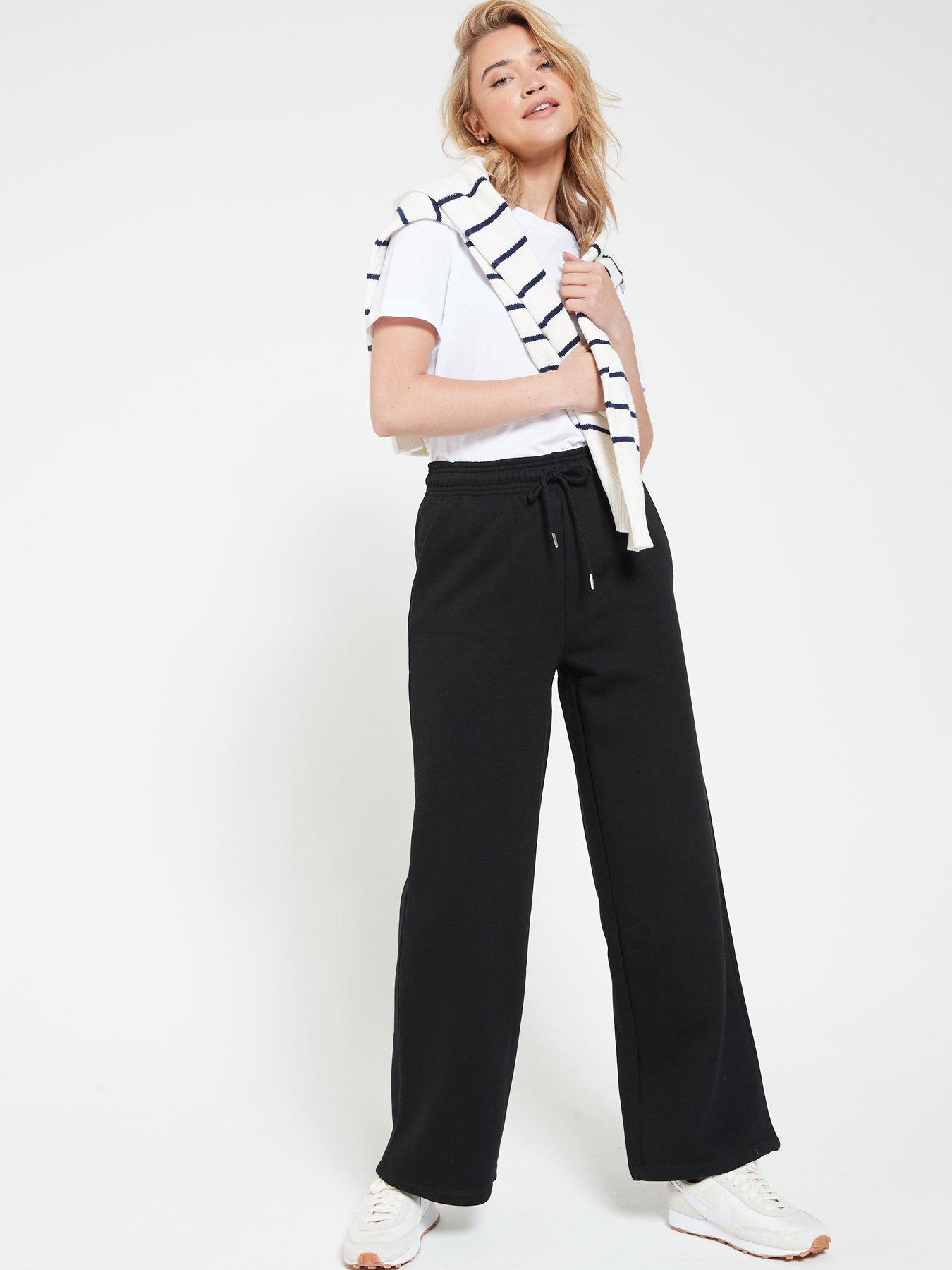 Puma ribbed high waisted wide leg pants in black - exclusive at ASOS