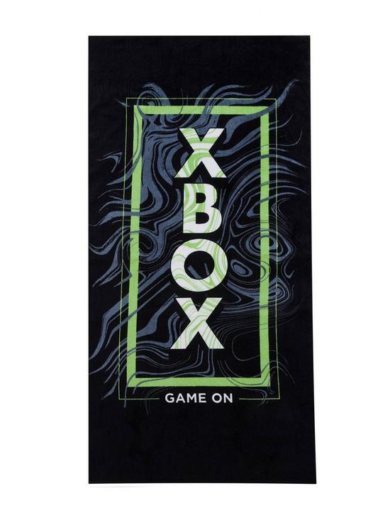 stillFront image of xbox-x-box-game-on-towel