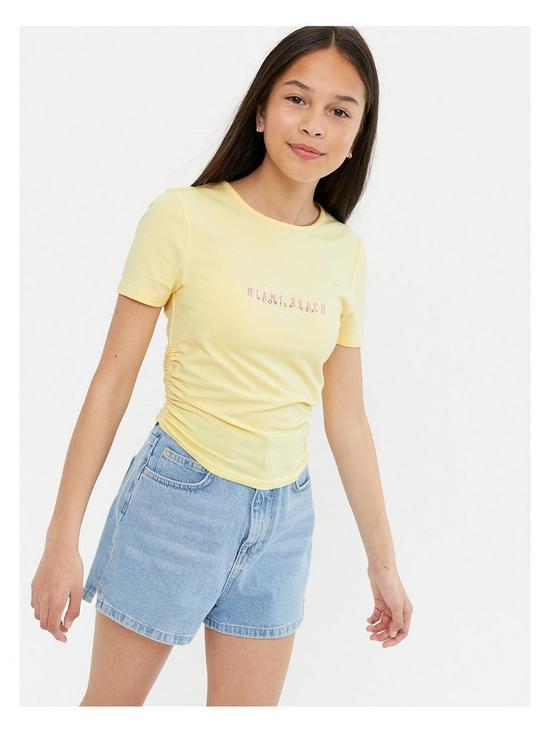front image of new-look-915-girlsnbspmiami-beach-logo-ruched-side-t-shirt-yellow