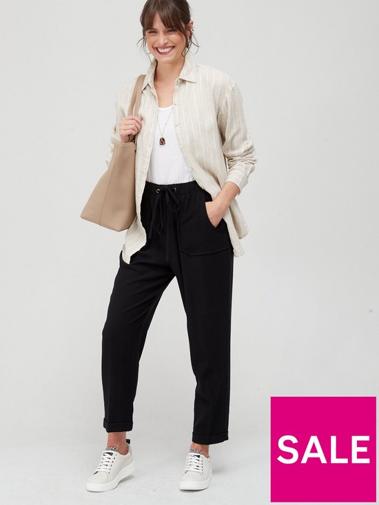front image of fig-basil-twill-easy-trouser-black
