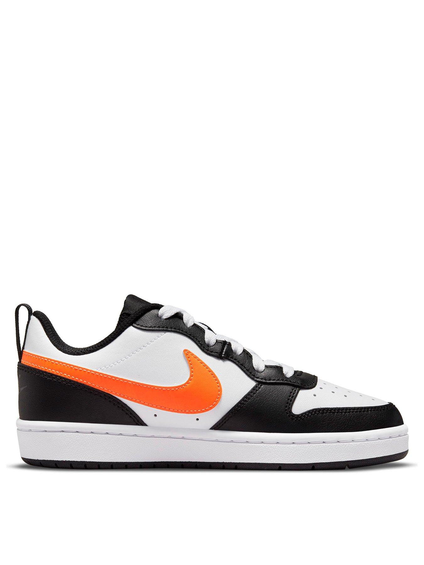 nike trainers with orange tick