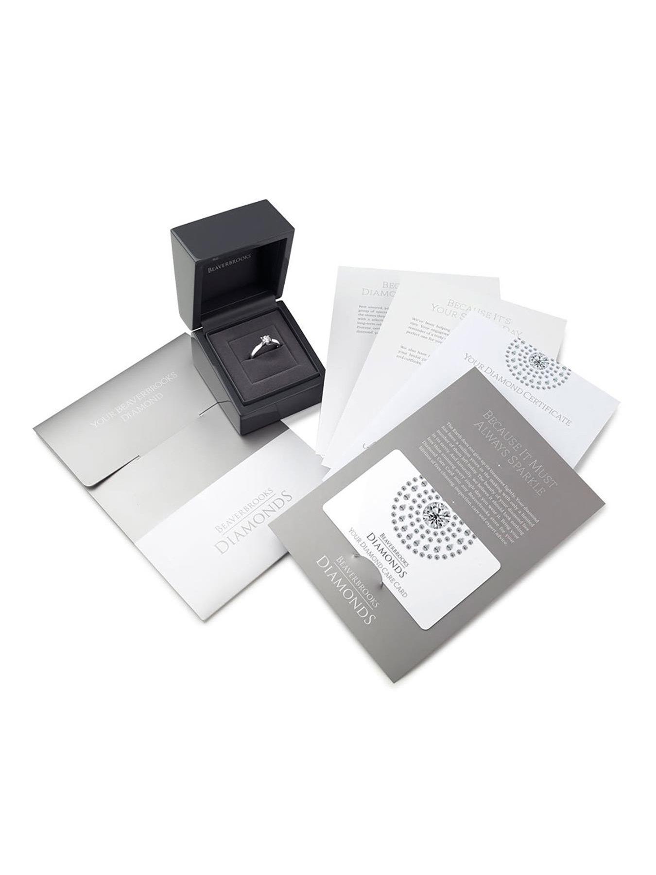 Beaverbrooks Platinum Diamond Oval Cut Halo Three Stone Engagement Ring