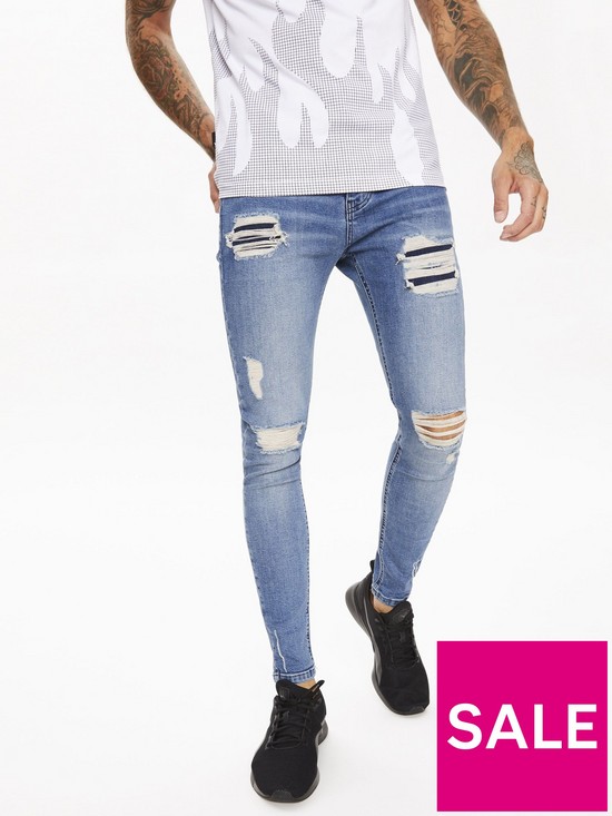 front image of 11-degrees-sustainable-distressed-skinny-fit-jeans-mid-blue-wash