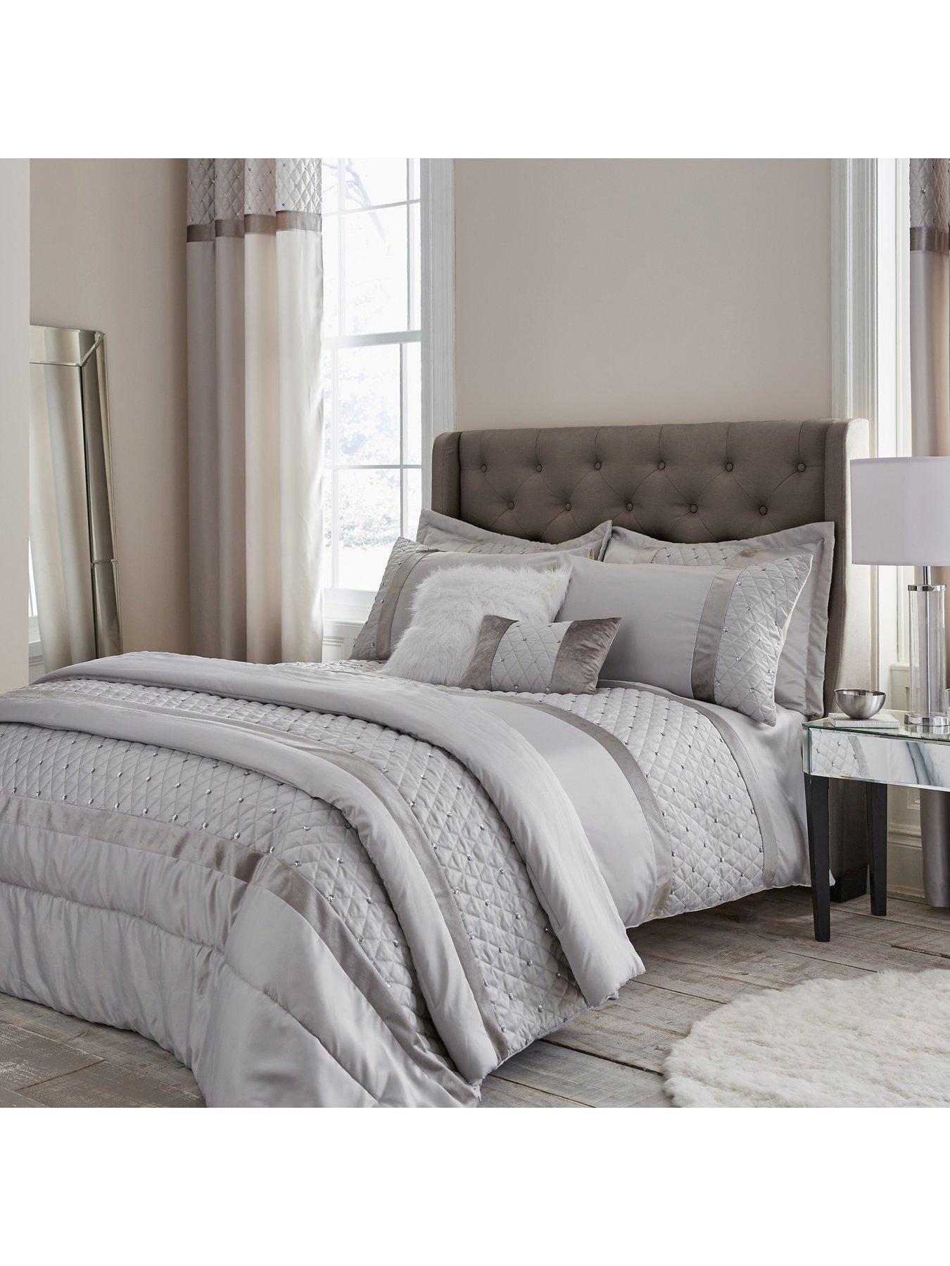 Product photograph of Catherine Lansfield Sequin Cluster Eyelet Curtains In Silver from very.co.uk