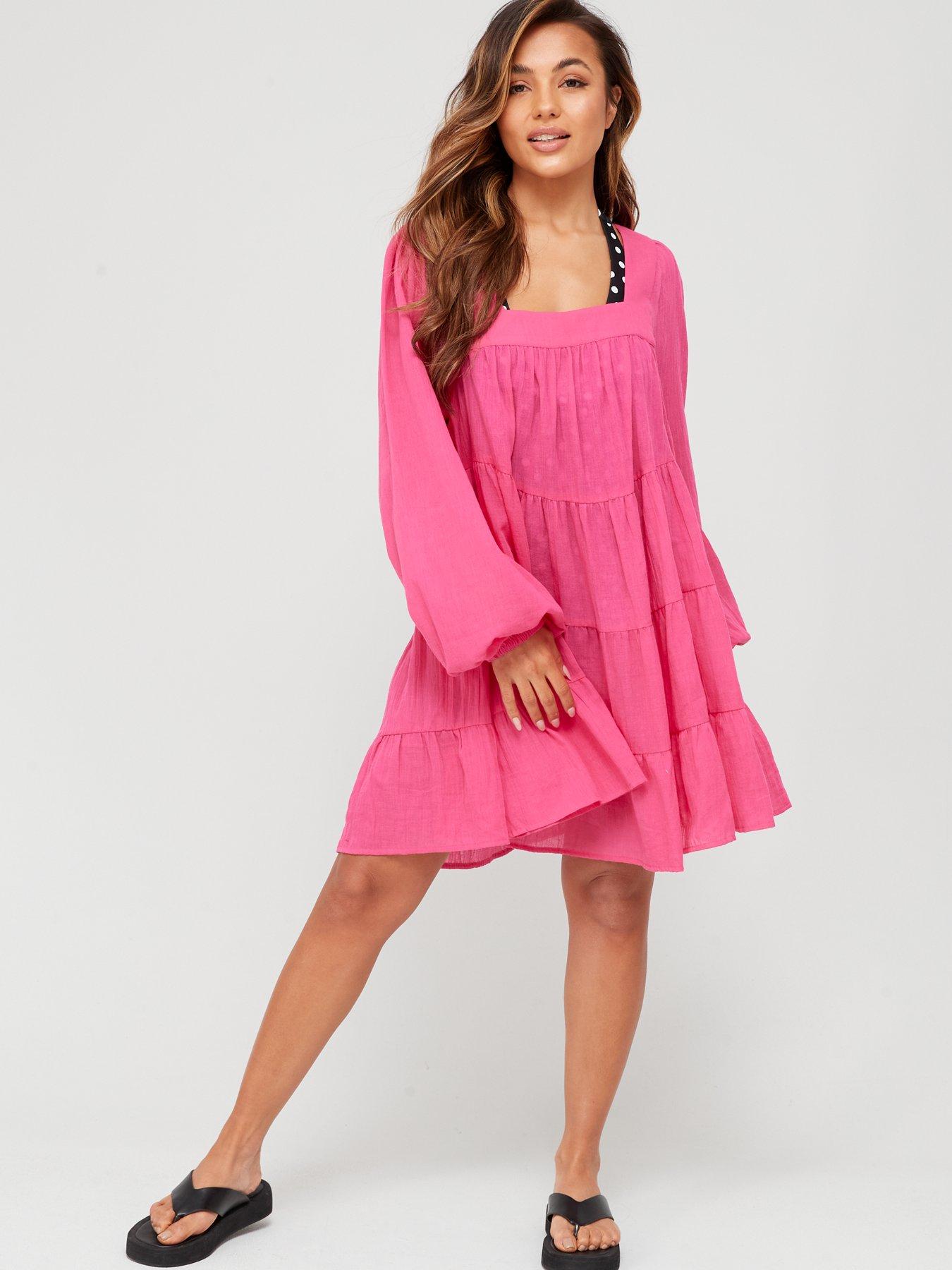 tight pink long sleeve dress