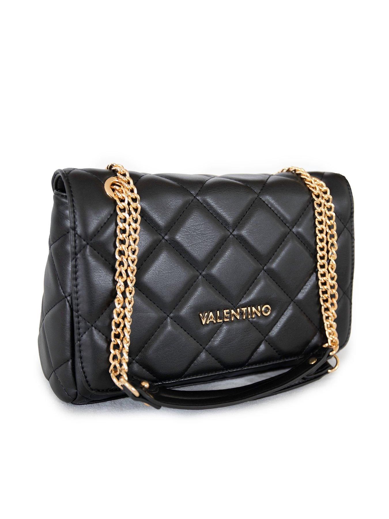 chanel black quilted bag leather