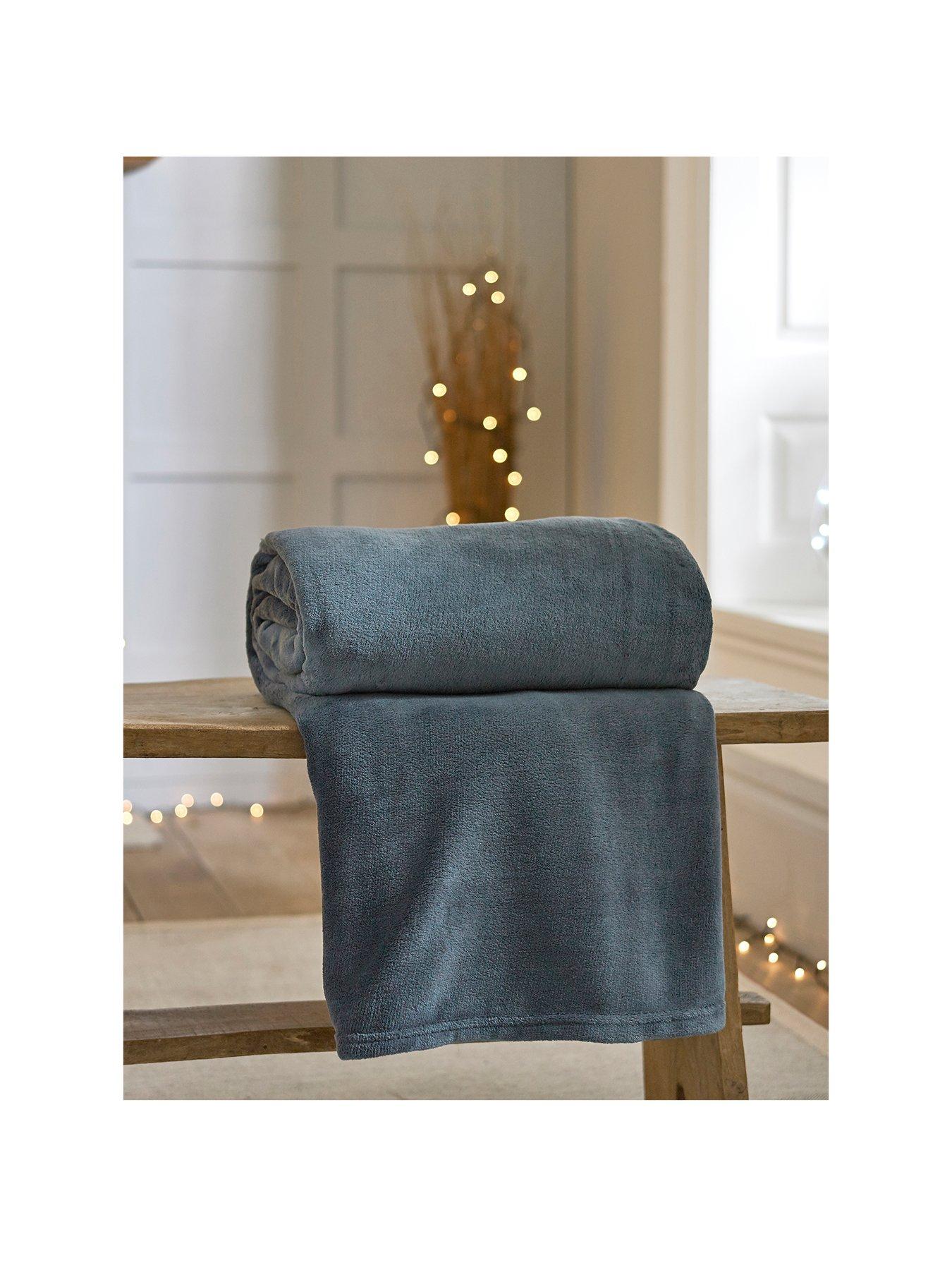 Product photograph of Deyongs Snuggle Touch Throw from very.co.uk