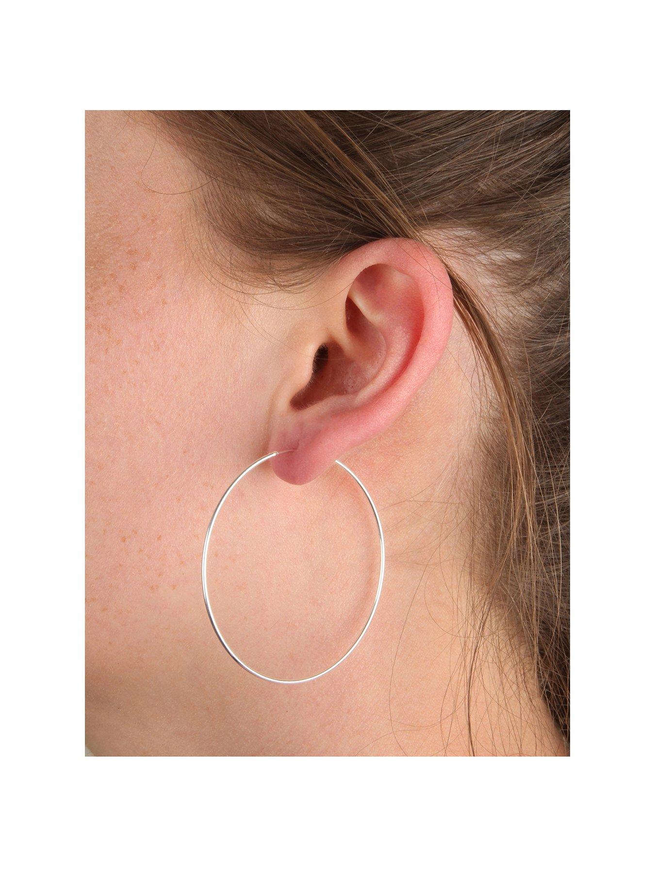 Product photograph of The Love Silver Collection Sterling Silver 50mm Large Sleeper Slim Hoop Earrings from very.co.uk