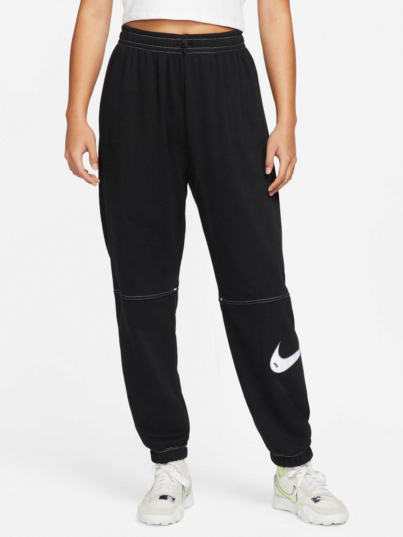 Nike mini swoosh oversized joggers in black hotsell