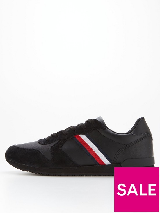 front image of tommy-hilfiger-iconic-leather-runner-trainers-black