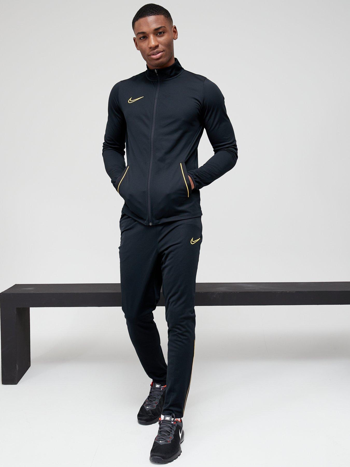 nike tracksuit black and orange