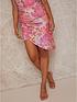 chi-chi-london-asymmetric-floral-print-skirt-pinkback