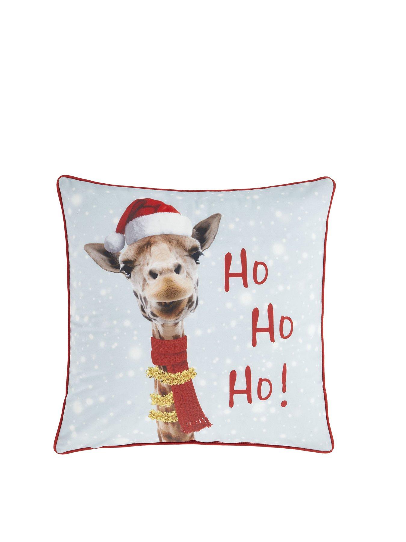 Product photograph of Catherine Lansfield Christmas Giraffe Filled Cushion from very.co.uk