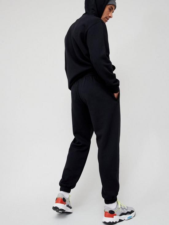 stillFront image of adidas-originals-trefoil-linear-label-sweat-pants-black