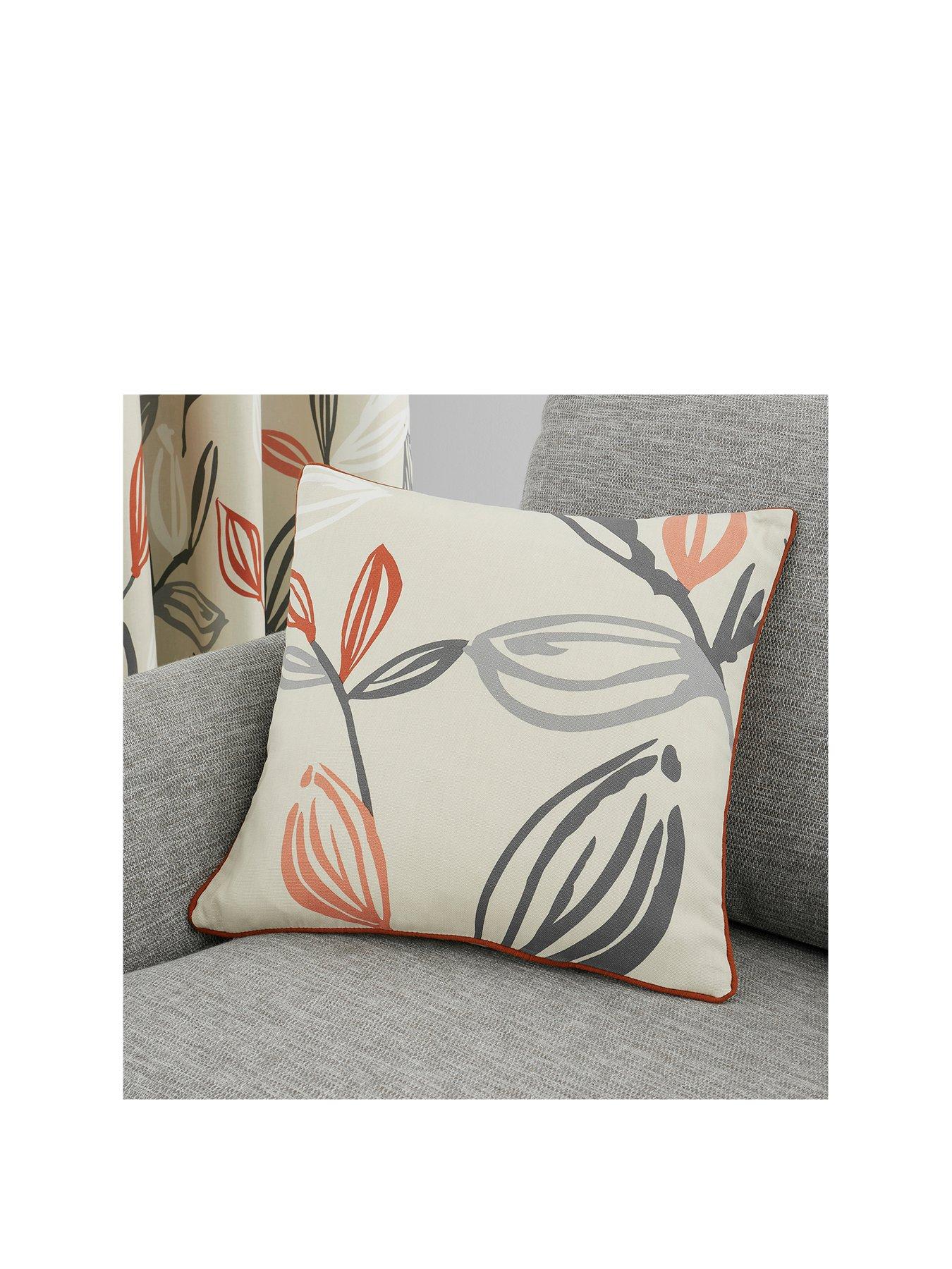 orange cushions and throws