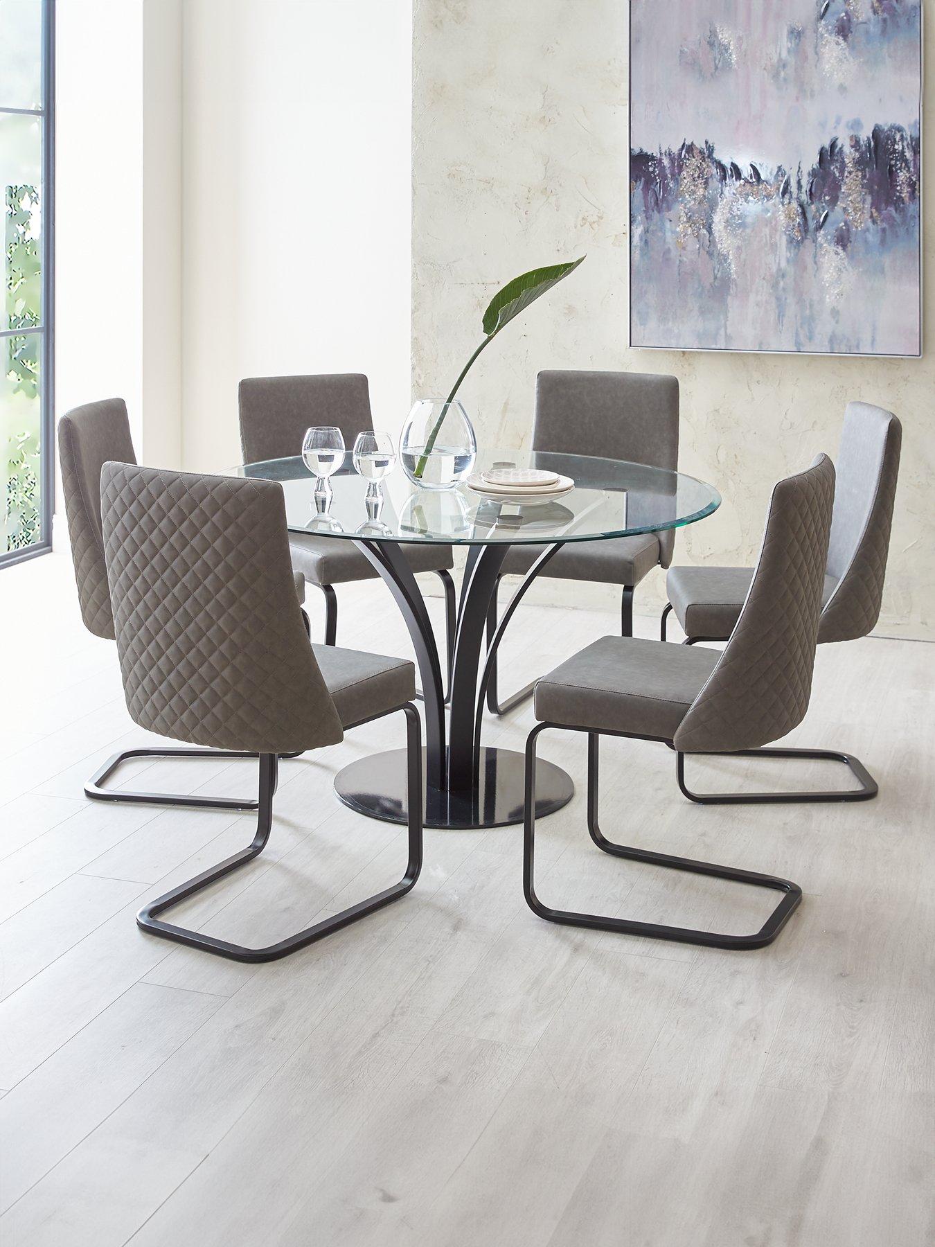 Round dining table discount with swivel chairs