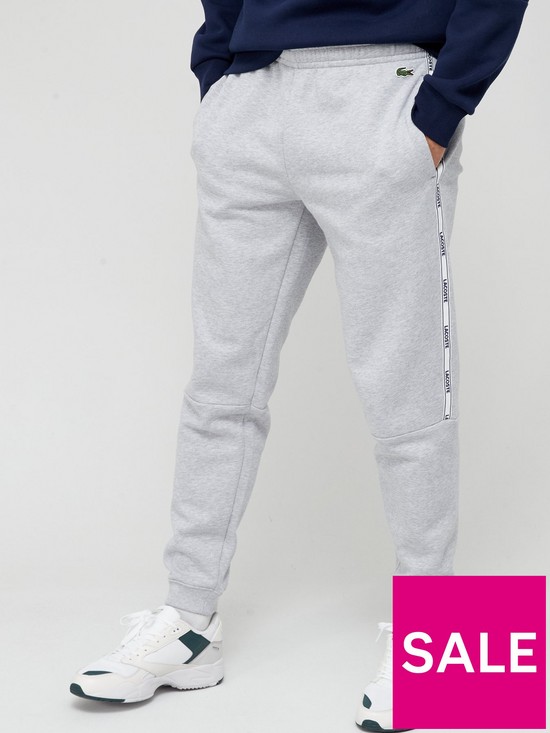 front image of lacoste-logo-taping-joggers-grey