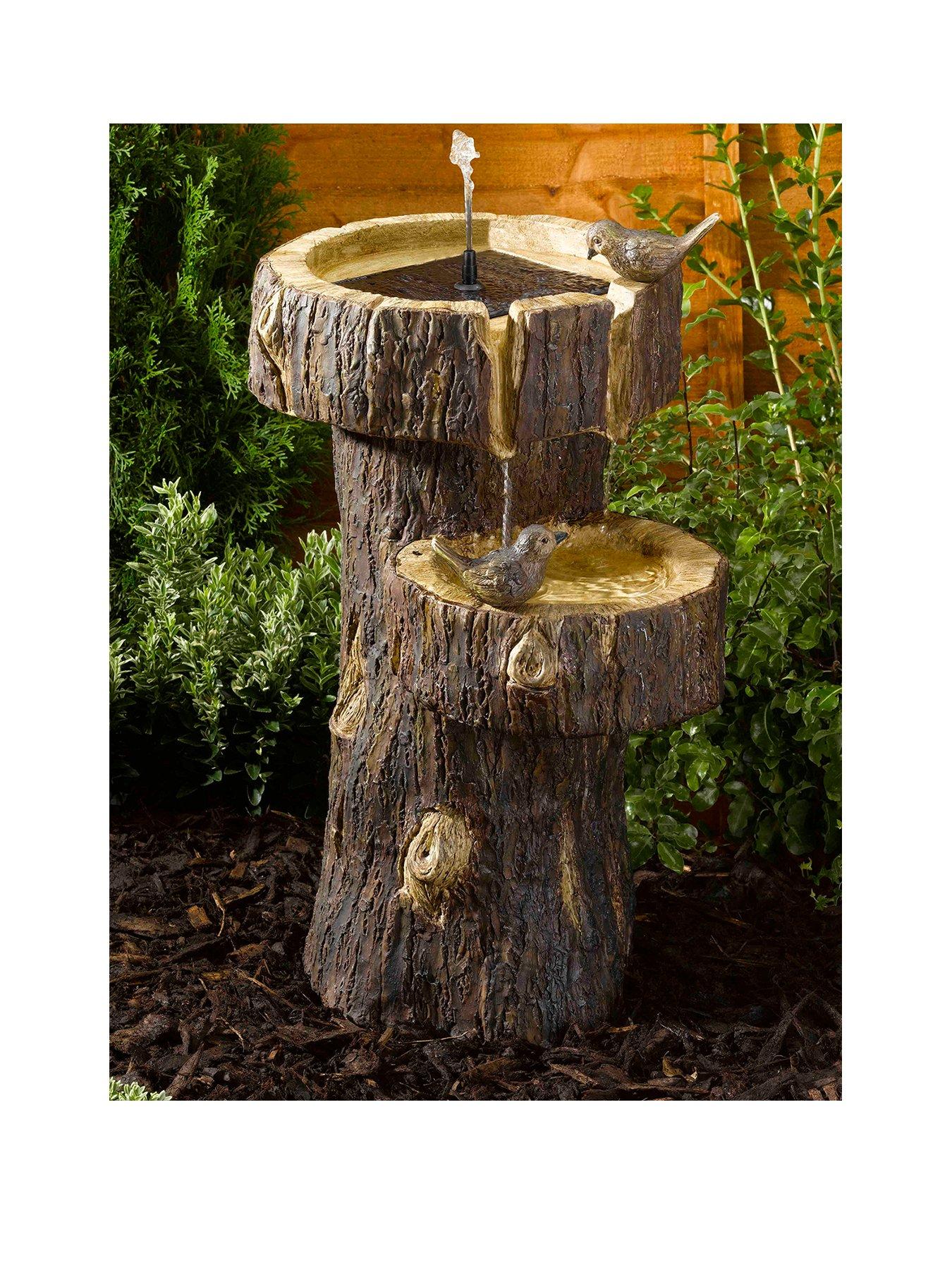Product photograph of Smart Solar Tree Trunk Solar On Demand Water Feature from very.co.uk