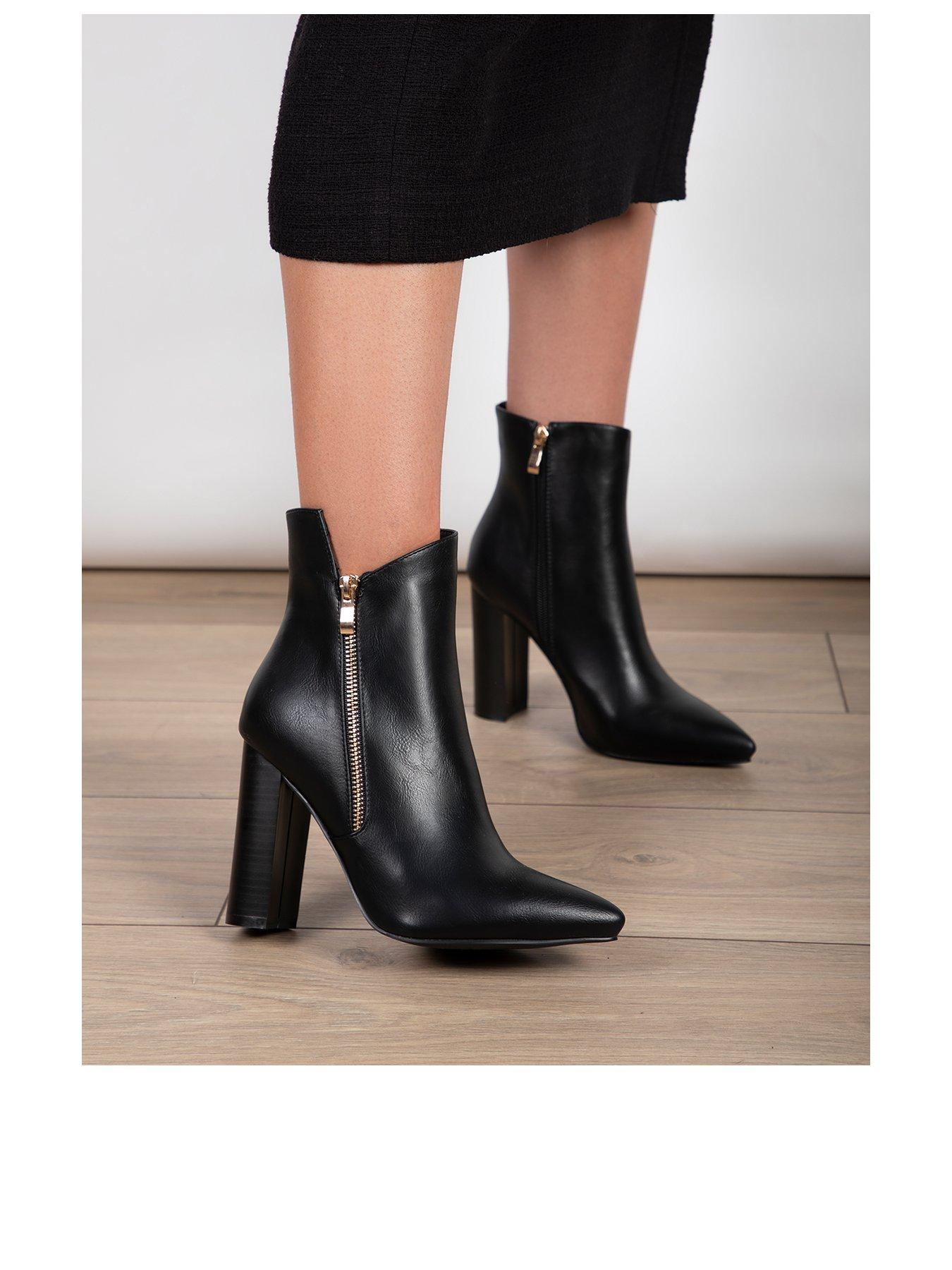 black heeled ankle boots