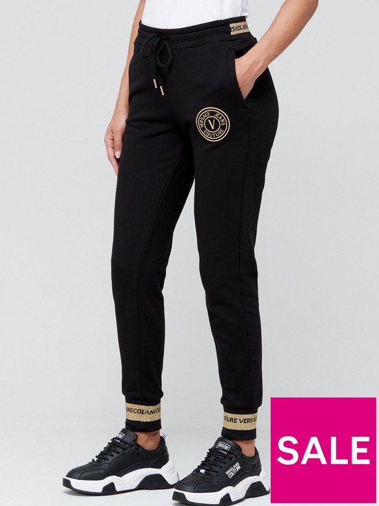 front image of versace-jeans-couture-circle-logo-joggers-black