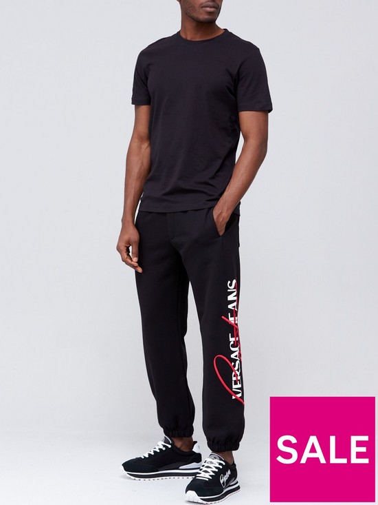 stillFront image of versace-jeans-couture-embroidered-logo-joggers-black