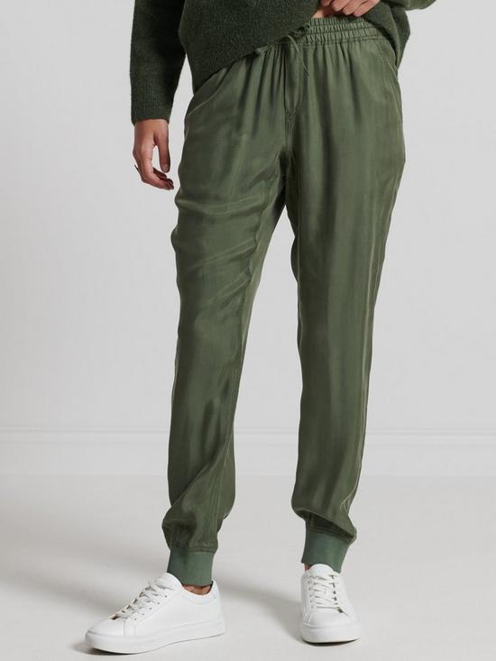 front image of superdry-studios-cupro-woven-trouser-green