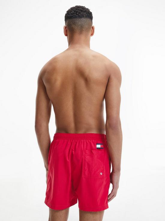 stillFront image of tommy-hilfiger-solid-flag-swim-shorts-red