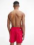  image of tommy-hilfiger-solid-flag-swim-shorts-red